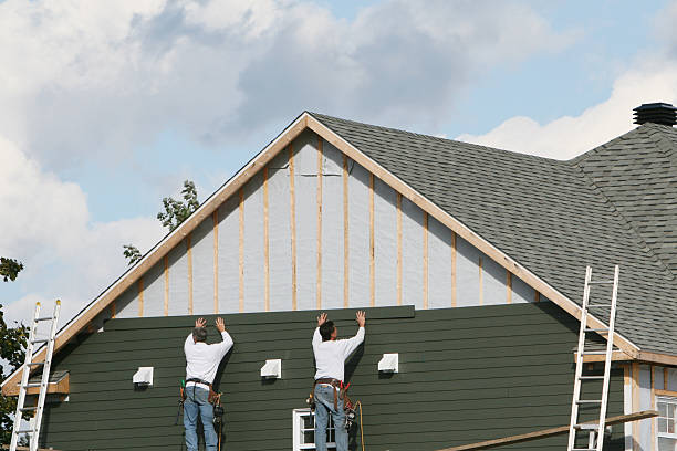 Professional Emergency Siding Repair technician working in Cambridge, OH